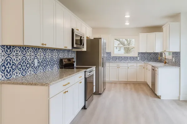 a view of a bathroom with a window