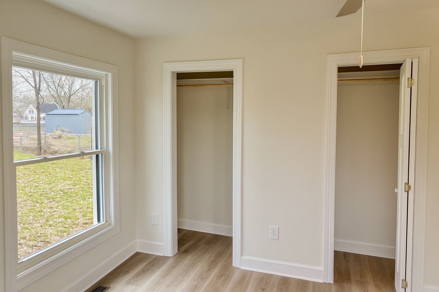 206 West Main Street Hohenwald, TN 38462 - Photo 16 of 24 a view of an empty room with wooden floor and a window