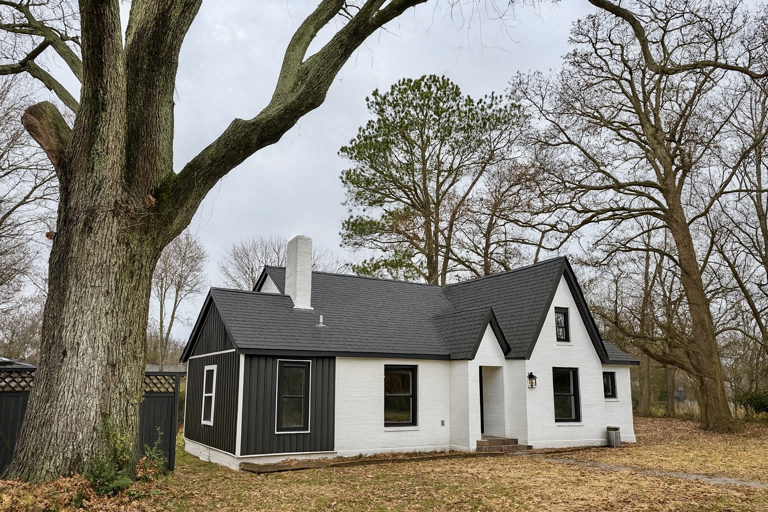 206 West Main Street Hohenwald, TN 38462 - Photo 2 of 24 a house with trees in the background