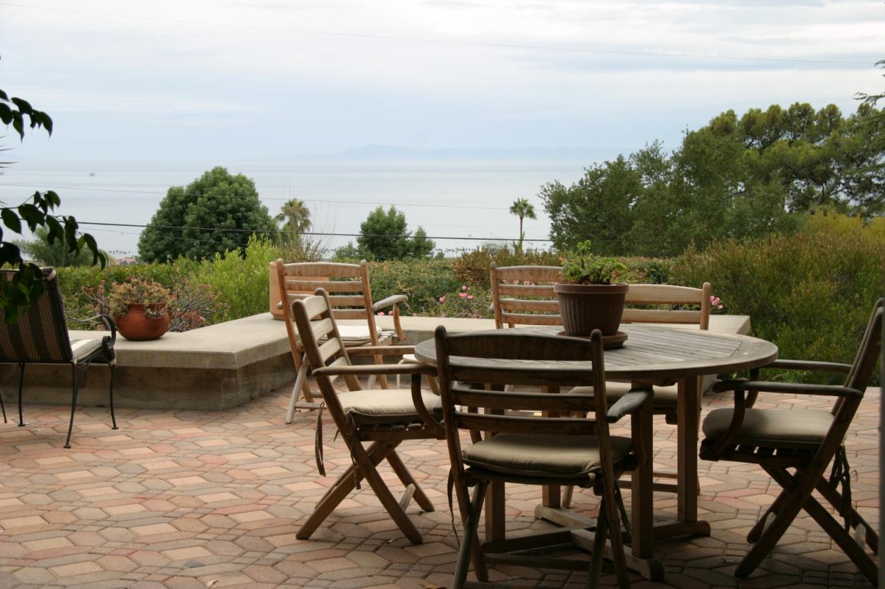 1140 Mission Ridge Road Santa Barbara, CA 93103 - Photo 6 of 8 a view of a dining table and chairs on the terrace