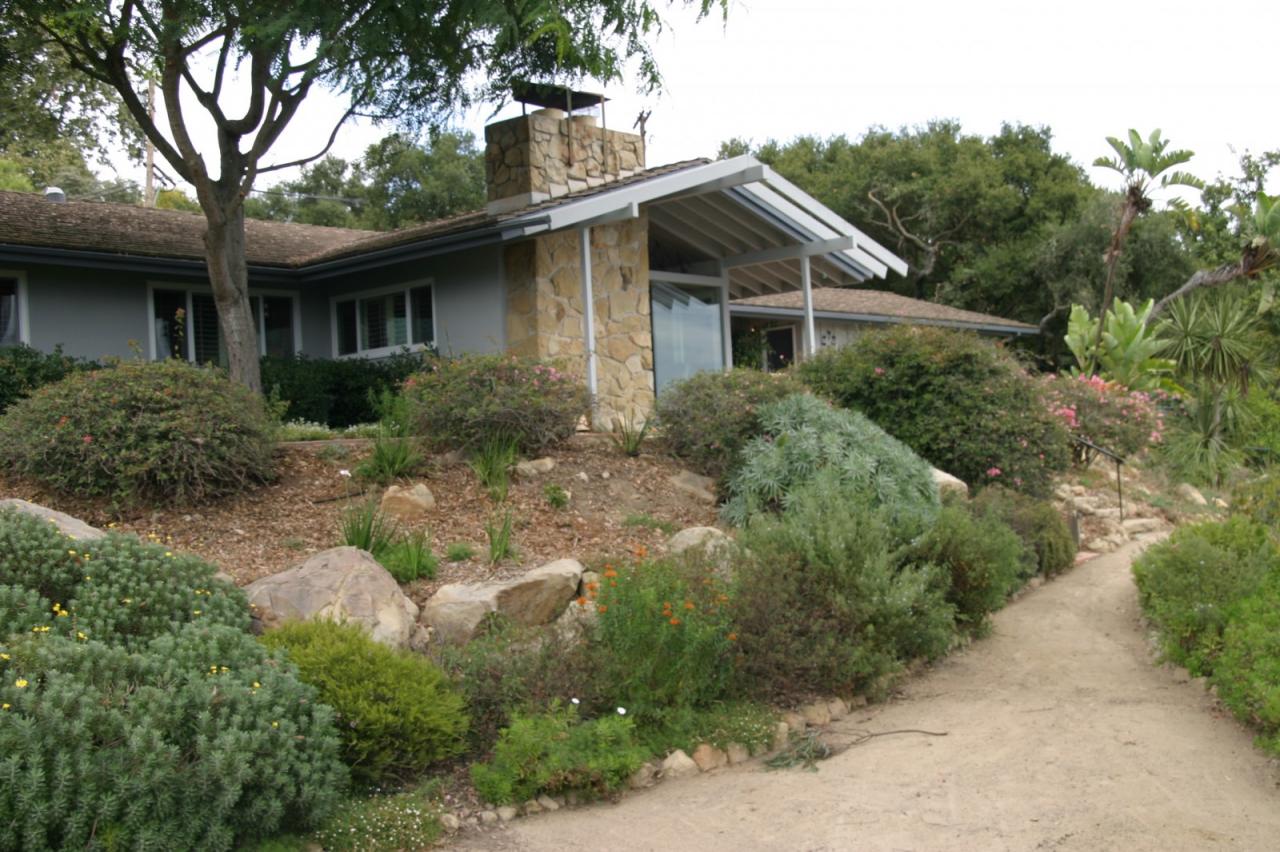 1140 Mission Ridge Road Santa Barbara, CA 93103 - Photo 8 of 8 a front view of house with yard and trees around