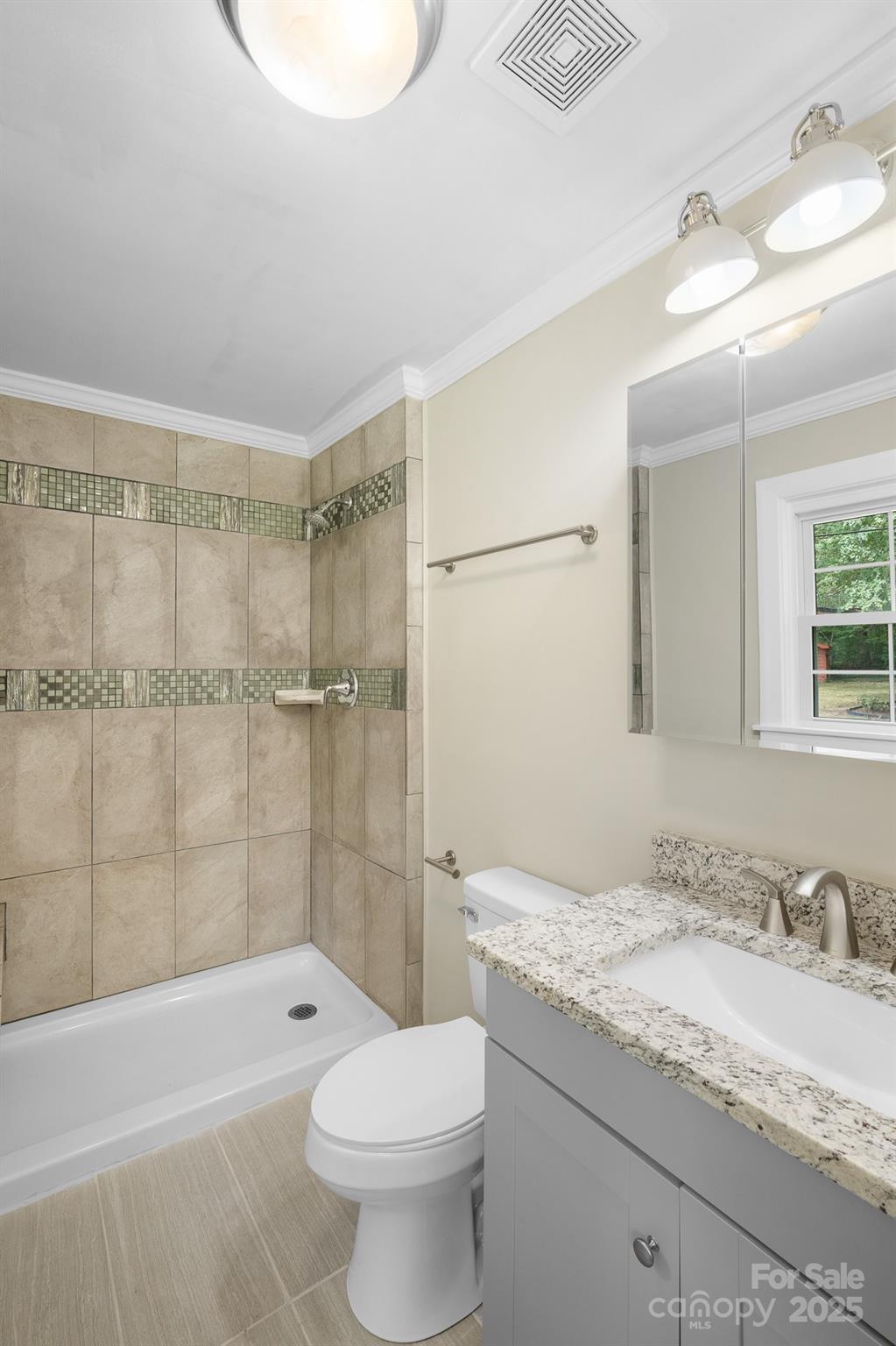 4355 Franklin Community Center Road Salisbury, NC 28144 - Photo 15 of 28 a bathroom with a granite countertop sink a toilet and shower