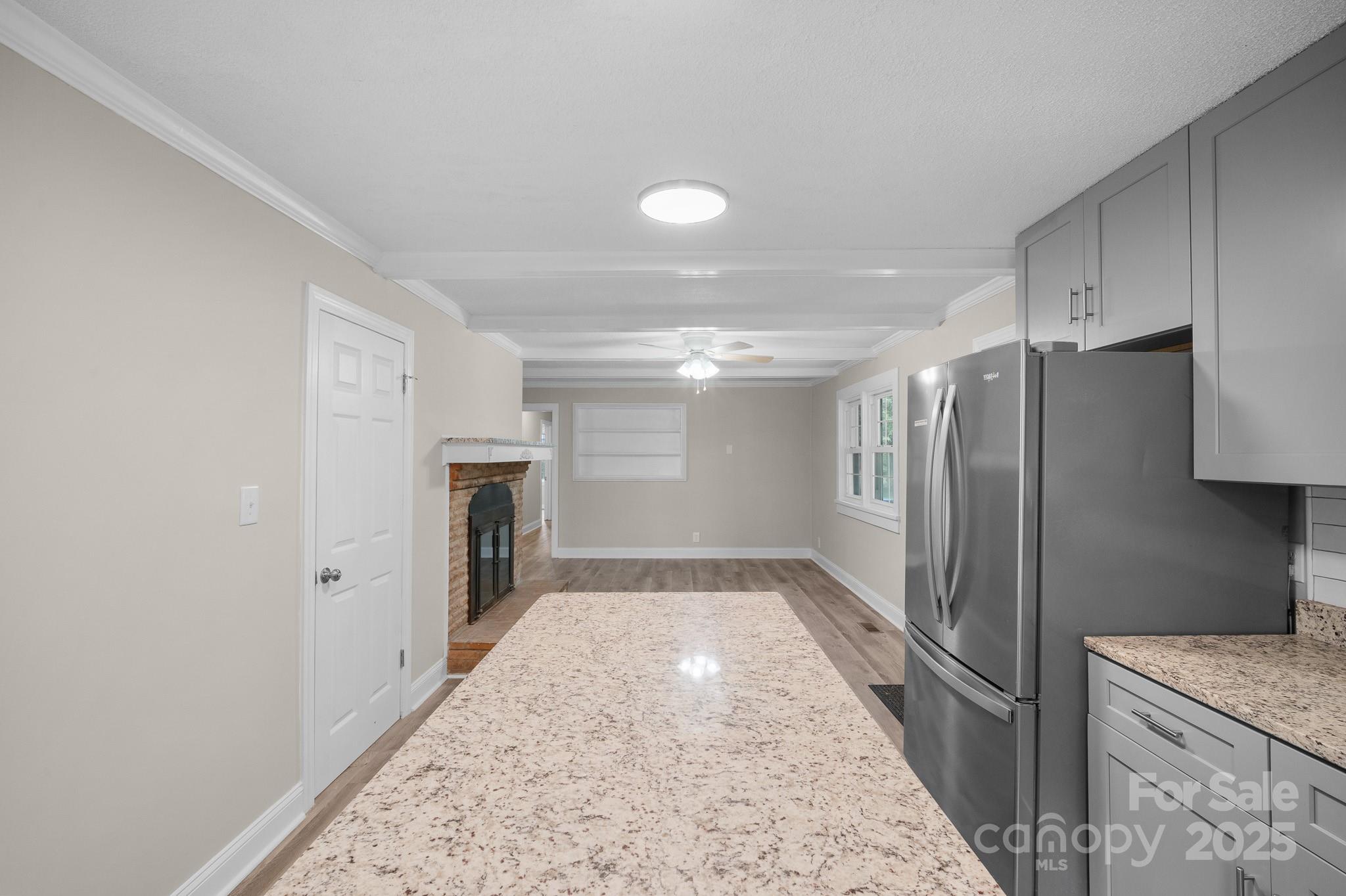 4355 Franklin Community Center Road Salisbury, NC 28144 - Photo 20 of 28 a view of a refrigerator in kitchen and wooden floor