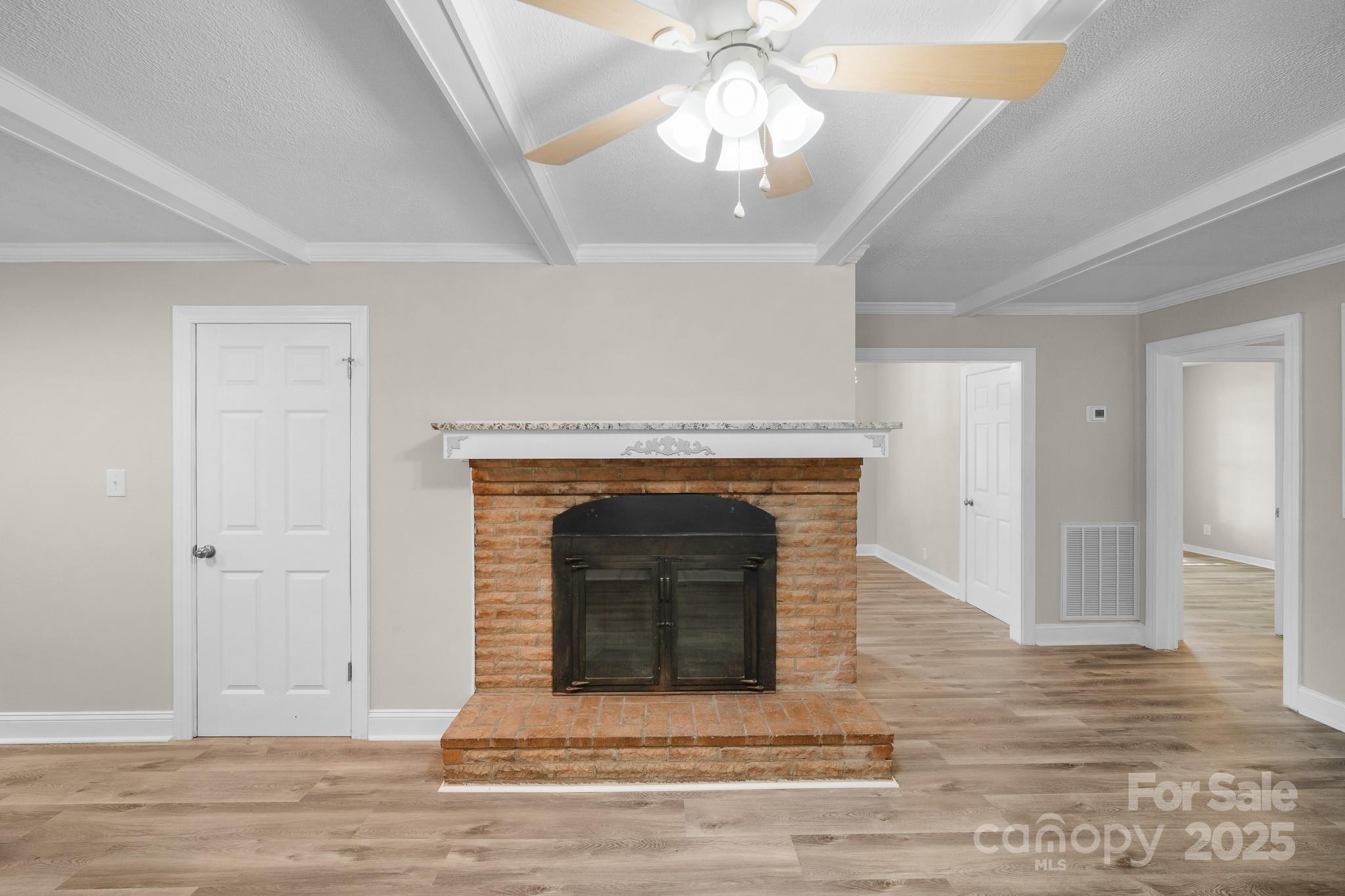 4355 Franklin Community Center Road Salisbury, NC 28144 - Photo 4 of 28 wooden floor fireplace and wooden floor