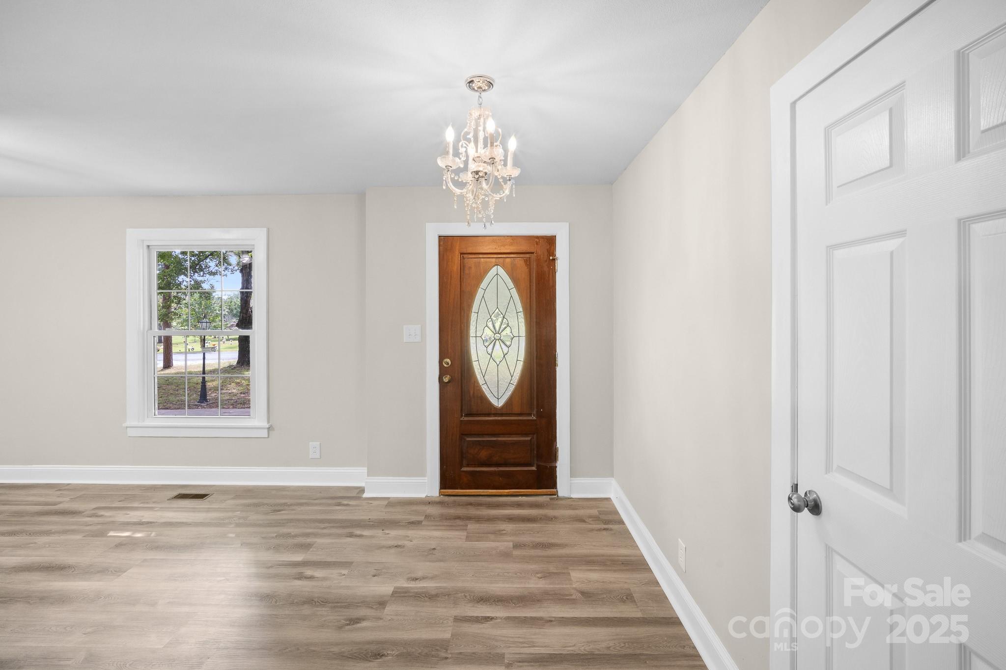 4355 Franklin Community Center Road Salisbury, NC 28144 - Photo 10 of 28 a view of an entryway with wooden floor