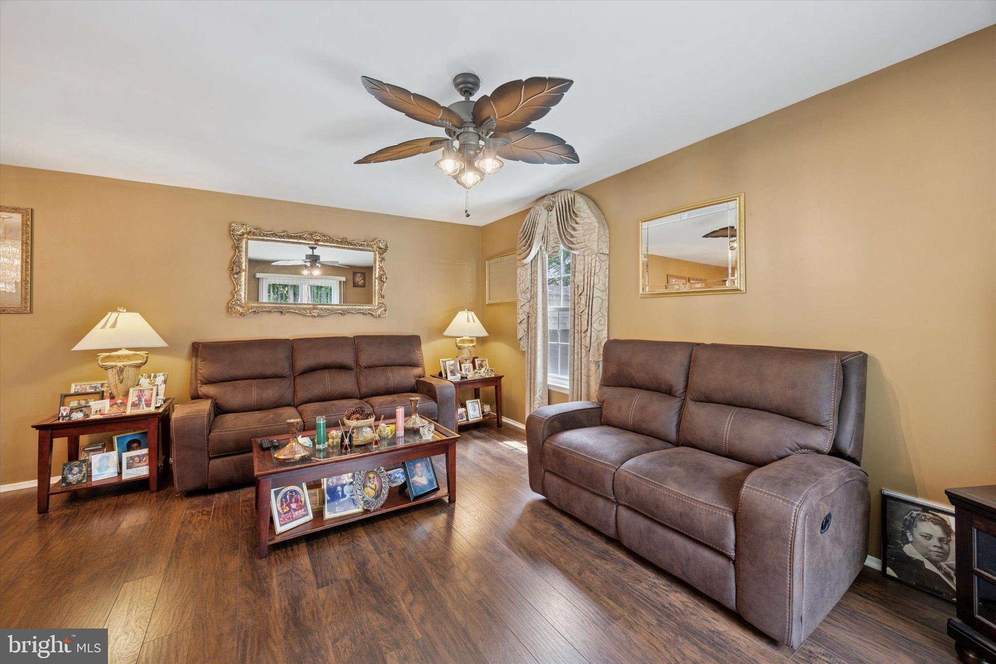 27 Iris Lane Newark, DE 19702 - Photo 13 of 31 a living room with furniture and a chandelier