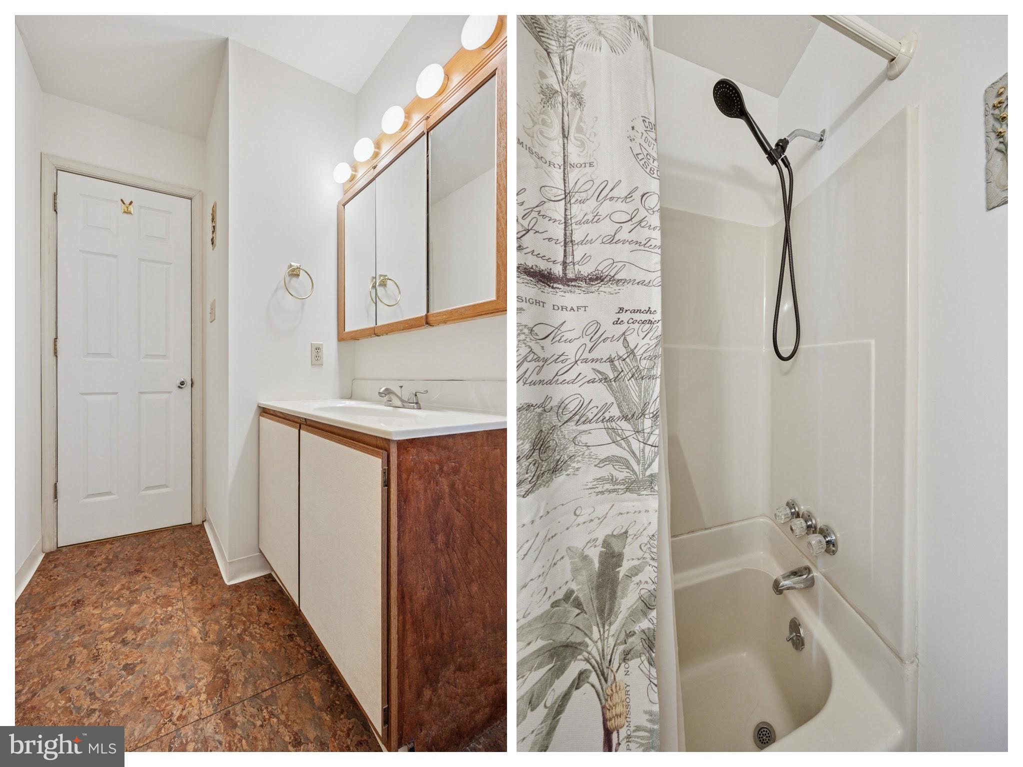 27 Iris Lane Newark, DE 19702 - Photo 21 of 31 a bathroom with a granite countertop shower a sink and a mirror
