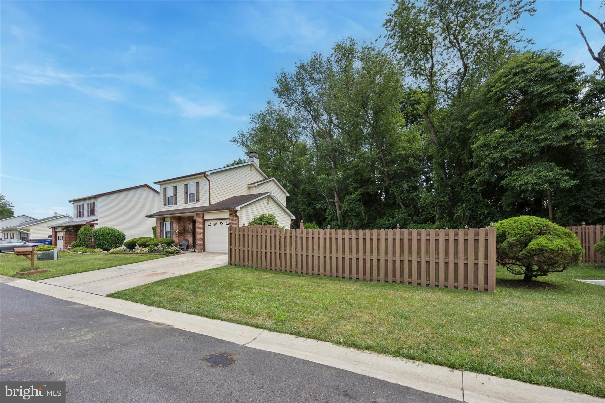 27 Iris Lane Newark, DE 19702 - Photo 5 of 31 a view of a house with a yard and fence
