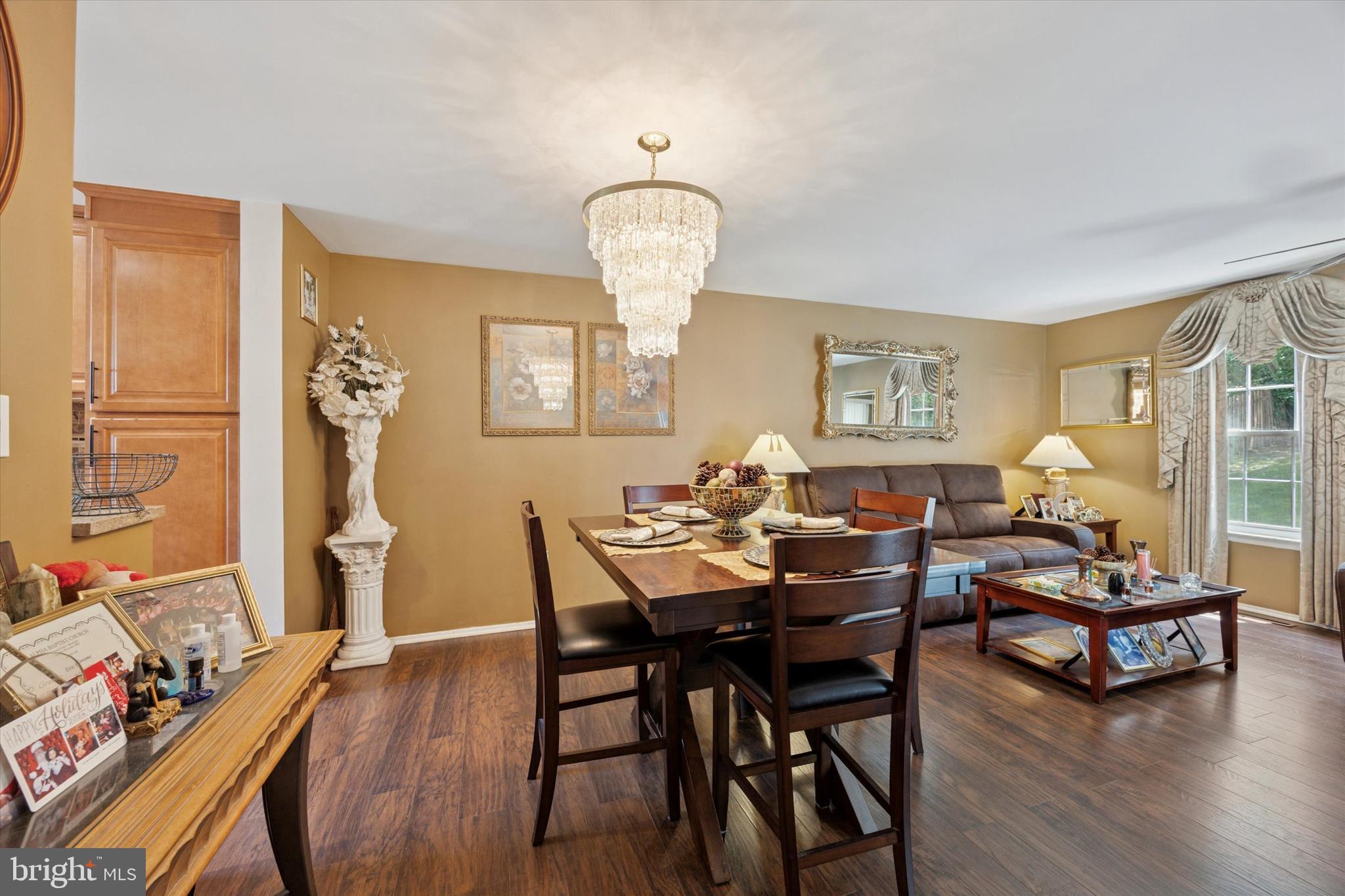 27 Iris Lane Newark, DE 19702 - Photo 6 of 31 a view of a dining room with furniture and wooden floor