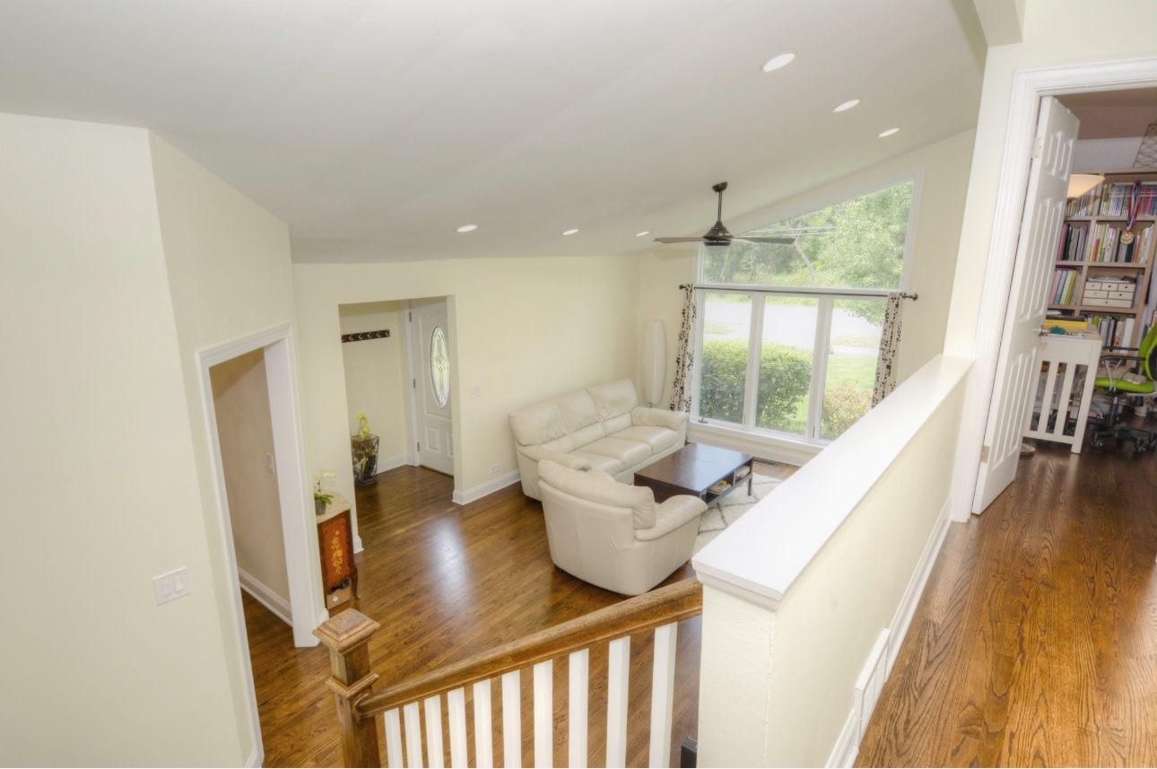 1115 Harms Road Glenview, IL 60025 - Photo 11 of 34 a view of entryway and hall with wooden floor