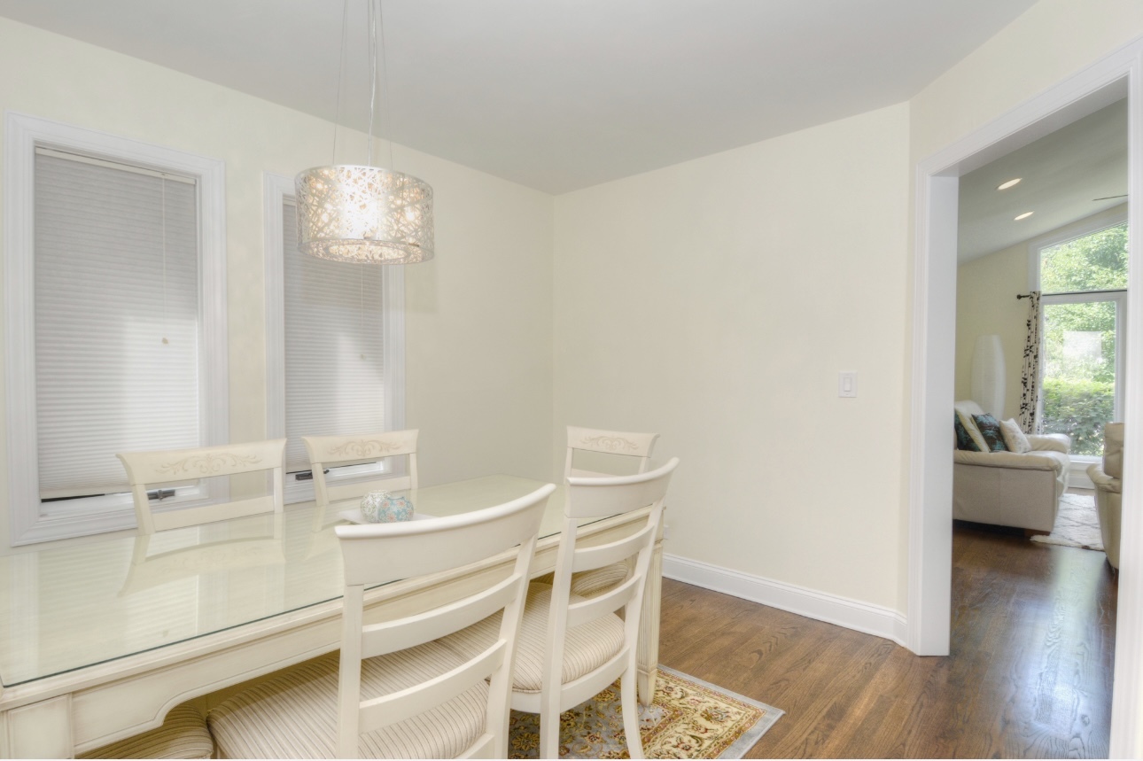 1115 Harms Road Glenview, IL 60025 - Photo 12 of 34 walk in closet with wooden floor