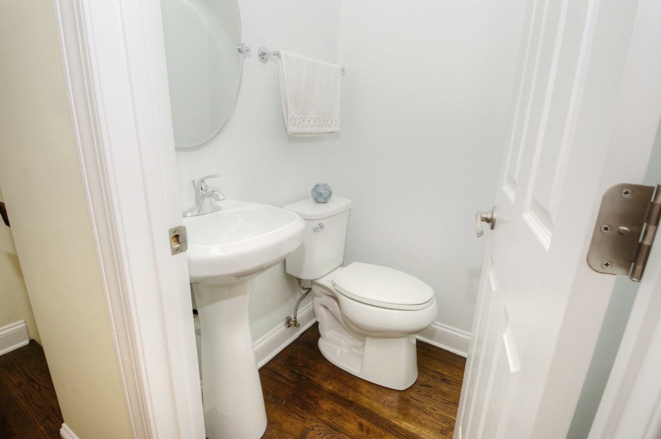 1115 Harms Road Glenview, IL 60025 - Photo 27 of 34 a bathroom with a sink and a toilet