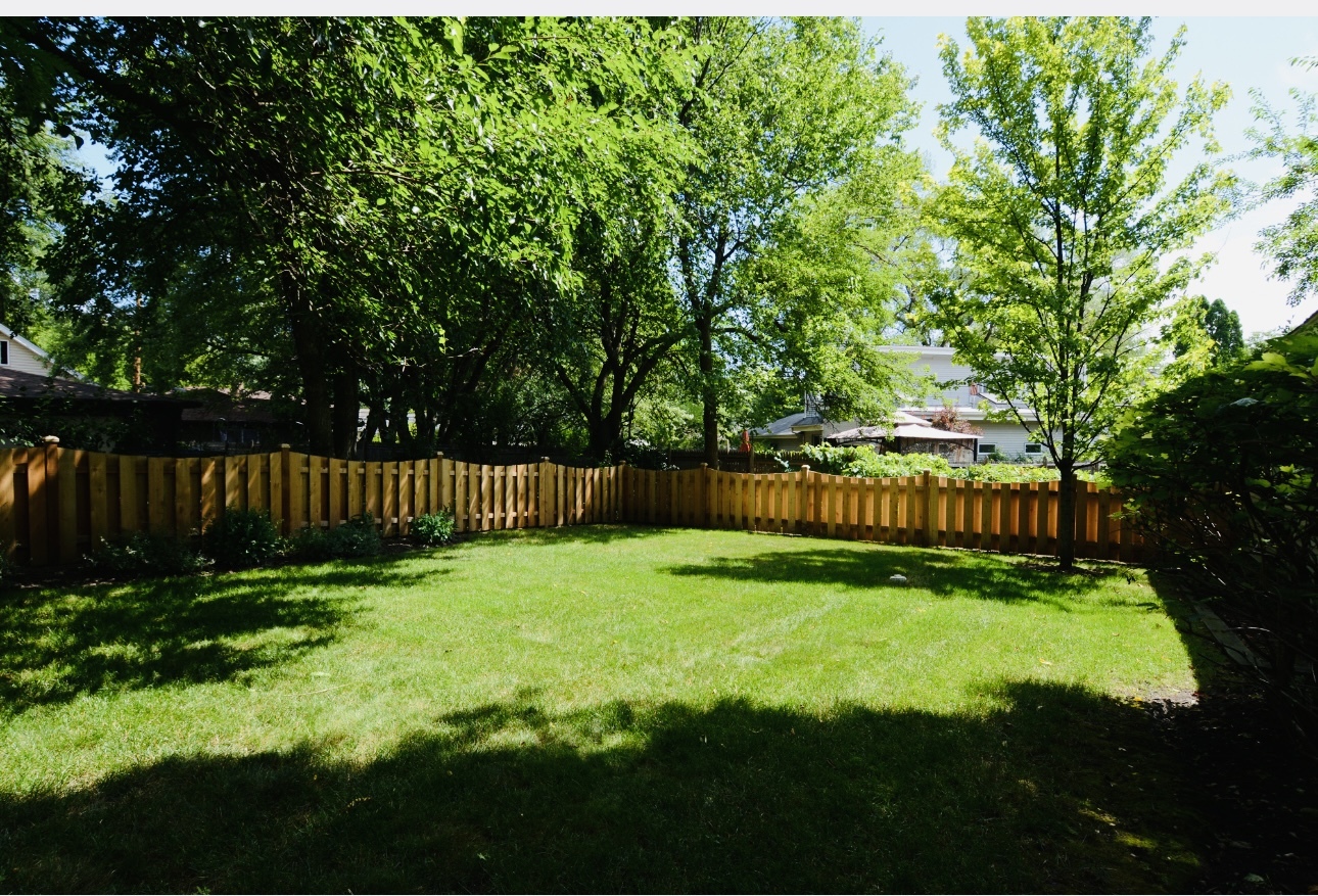 1115 Harms Road Glenview, IL 60025 - Photo 34 of 34 a view of a backyard with a small cabin
