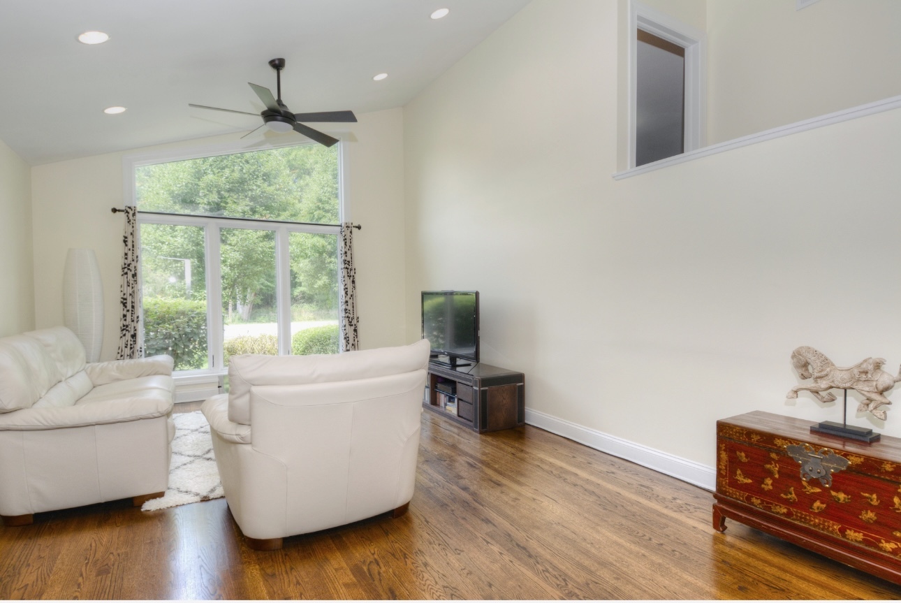 1115 Harms Road Glenview, IL 60025 - Photo 6 of 34 a living room with furniture and a large window