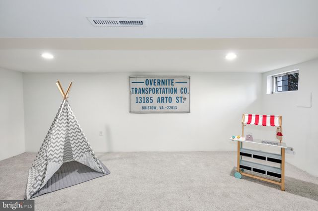 a room with furniture and couch