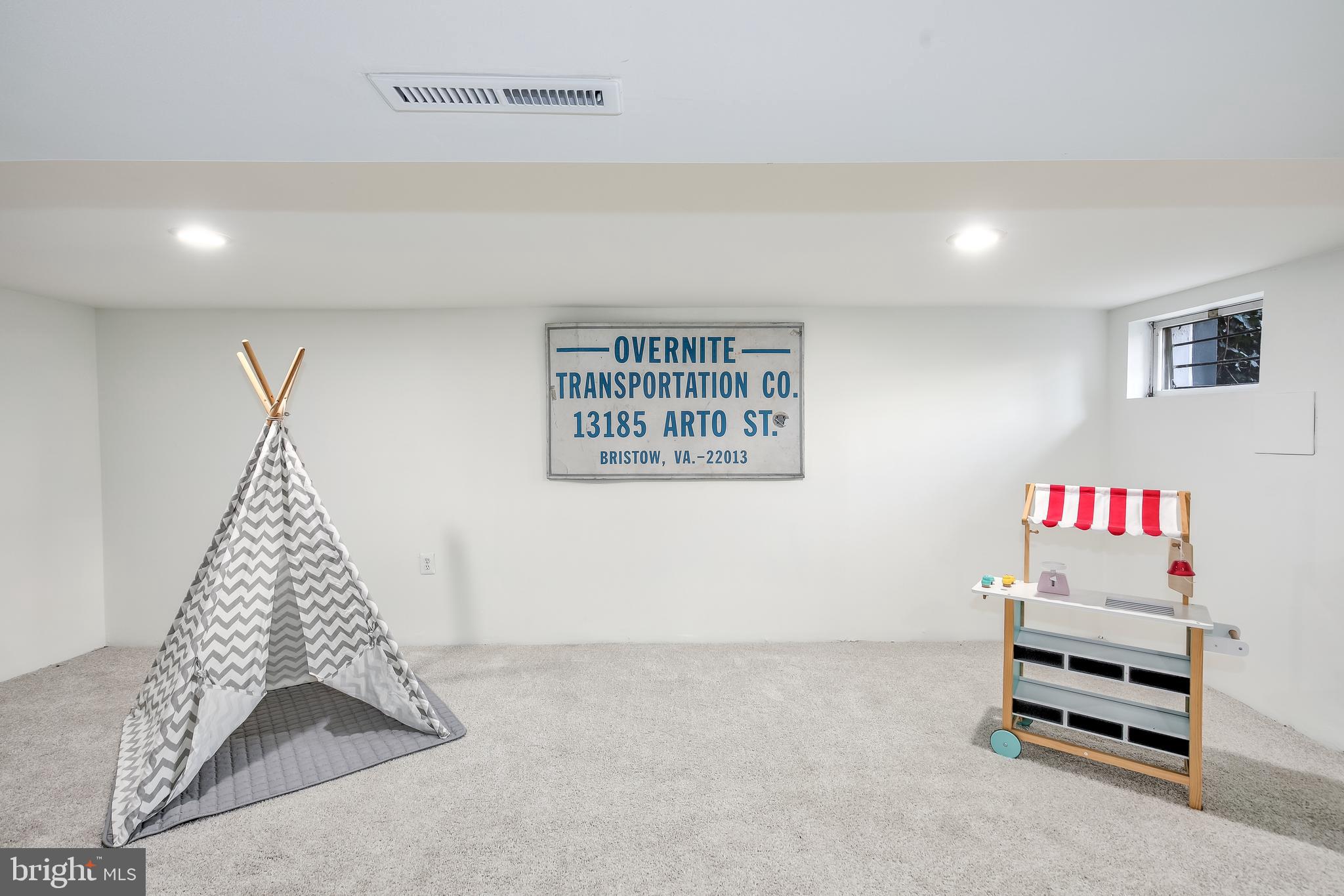 1932 First Street Northeast Washington, DC 20002 - Photo 16 of 21 a room with furniture and couch