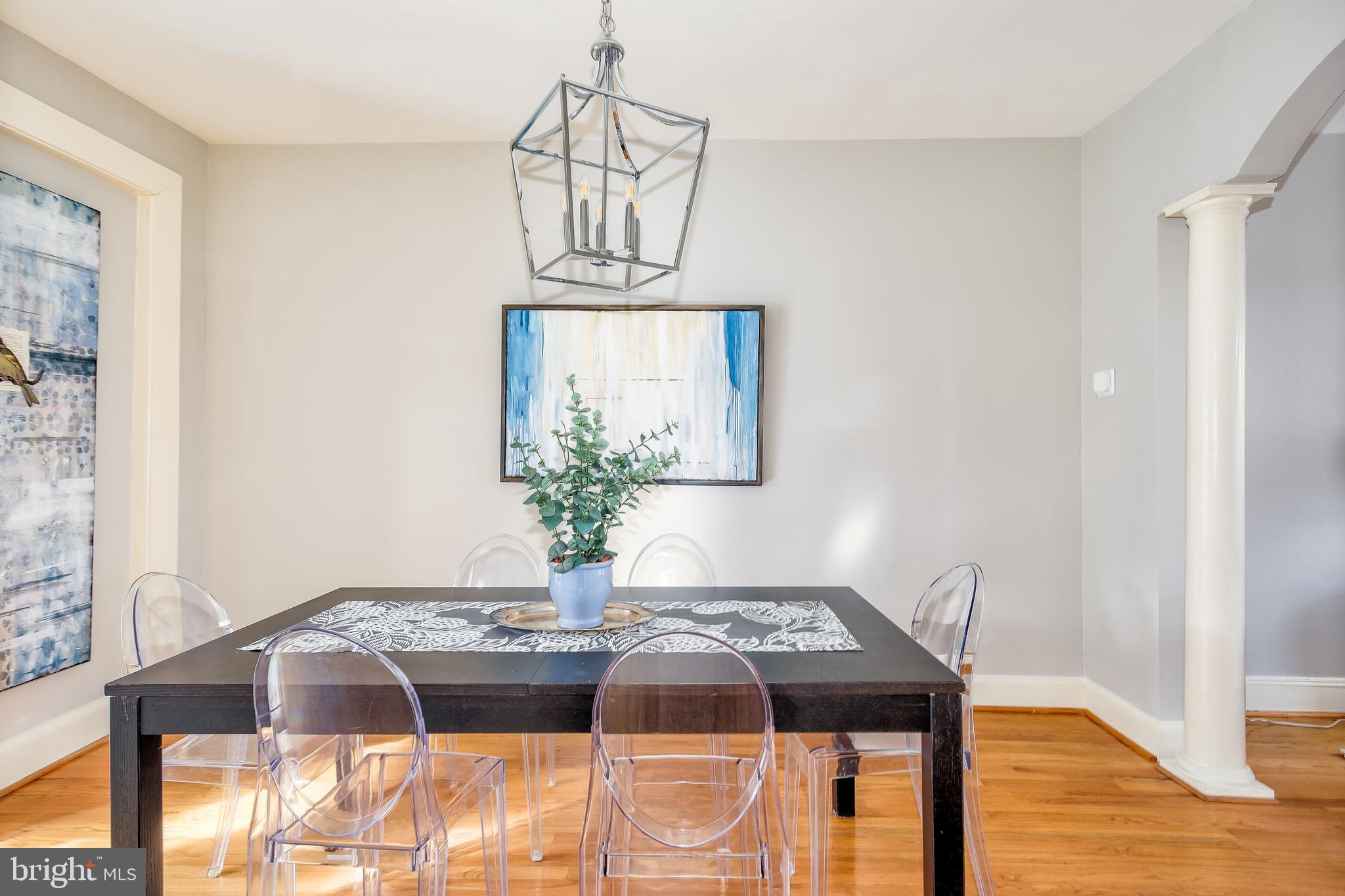 1932 First Street Northeast Washington, DC 20002 - Photo 5 of 21 a view of a dining room with furniture and wooden floor