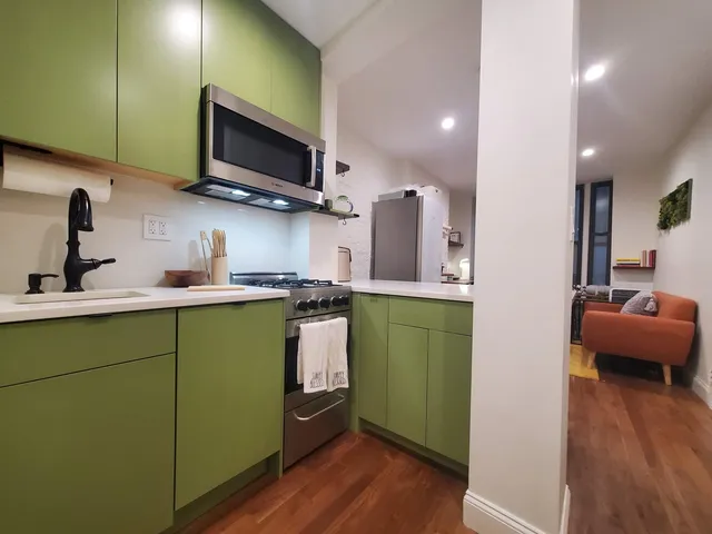 a workspace with furniture and wooden floor