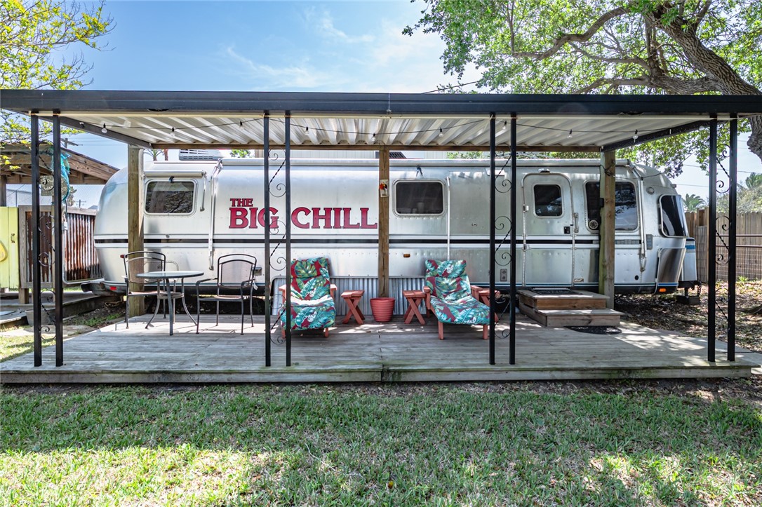 108 North 2nd Street Fulton, TX 78382 - Photo 8 of 23 a view of a chairs and table in patio