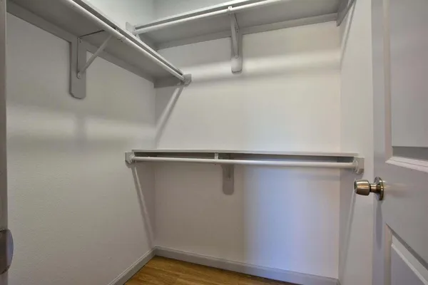 a view of a room with racks on the wall