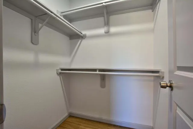 a view of a room with racks on the wall