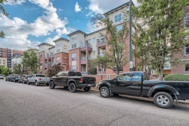 a view of a cars parked in a parking lot
