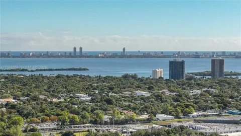 a view of a lake with a city