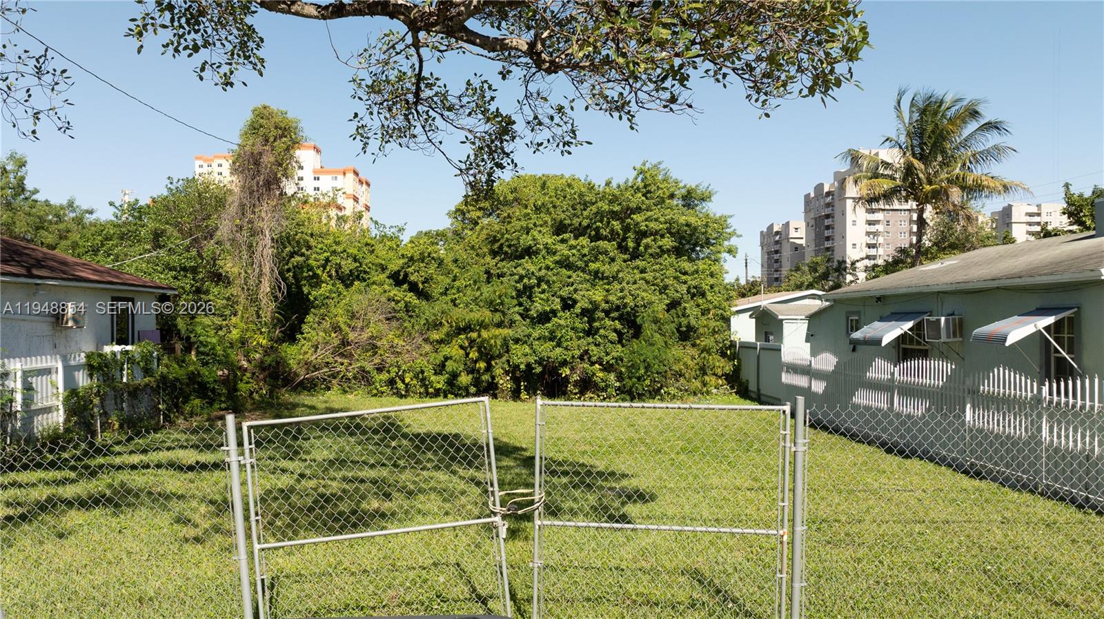 167 Northeast 76th Street Miami, FL 33138 - Photo 14 of 17 a view of a tennis court