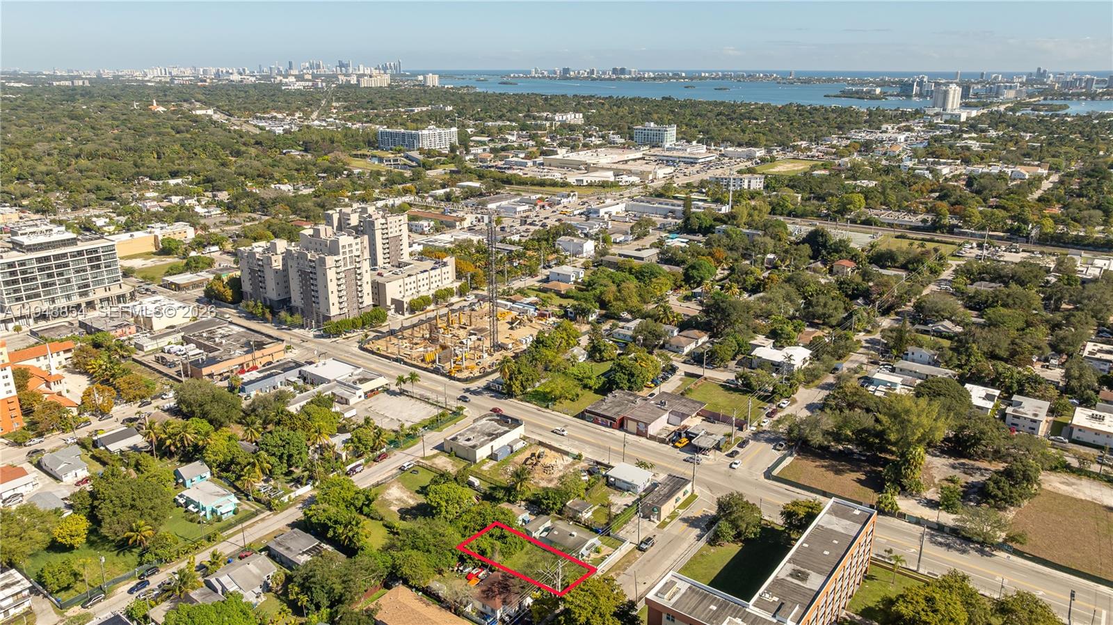 167 Northeast 76th Street Miami, FL 33138 - Photo 5 of 17 an aerial view of residential building with parking space