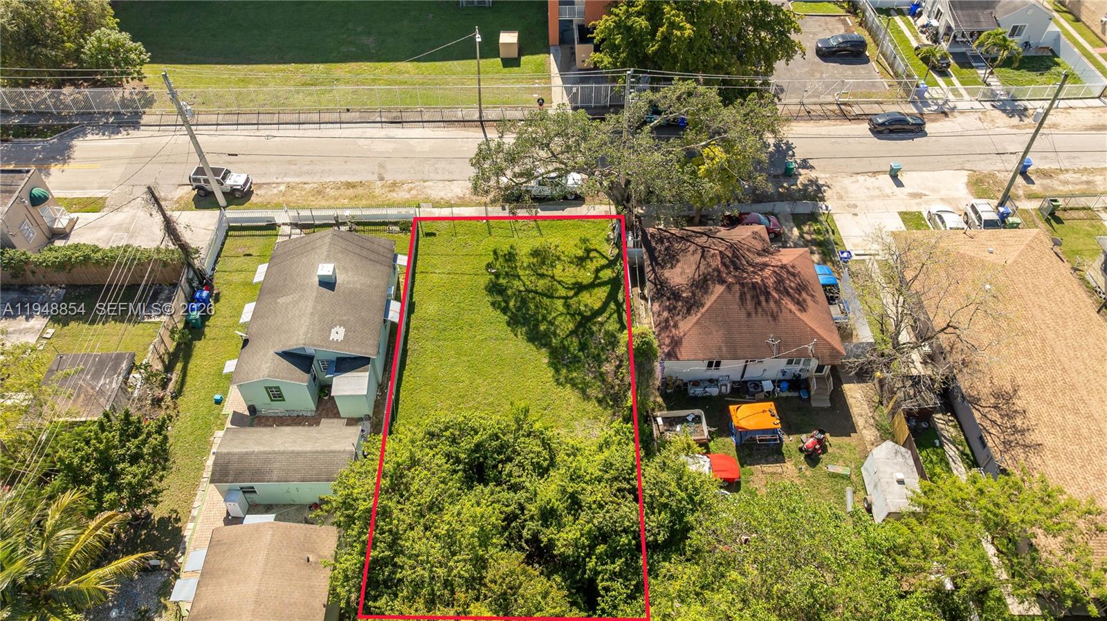 167 Northeast 76th Street Miami, FL 33138 - Photo 9 of 17 an aerial view of a house with a yard basket ball court and outdoor seating