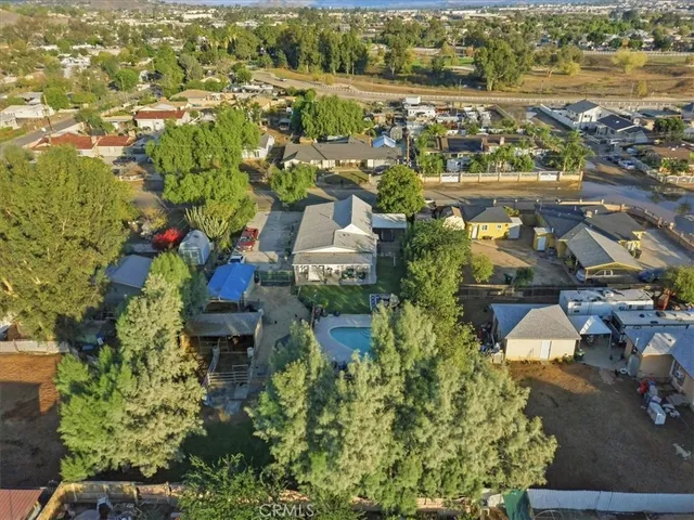 an aerial view of residential house with outdoor space and lake view
