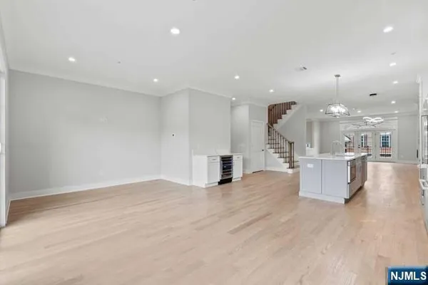a balcony with wooden floor and fence