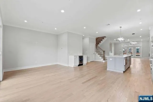 a balcony with wooden floor and fence
