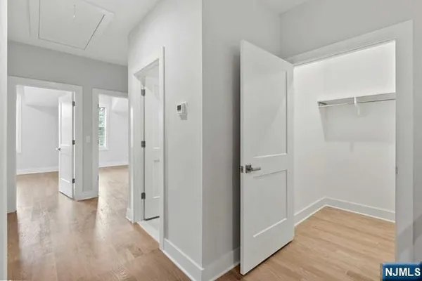 a bathroom with a granite countertop sink a toilet and bathtub