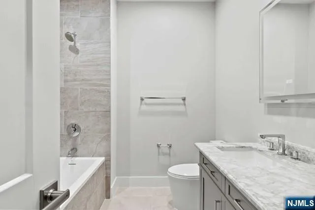 a view of a bathroom with mirror