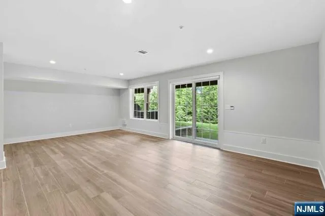 two chairs and a table in front of a house