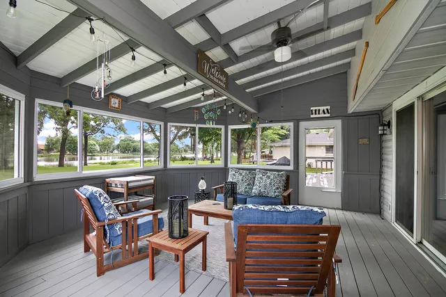 a huge green field with lots of trees