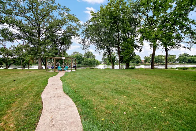a front view of a house with yard