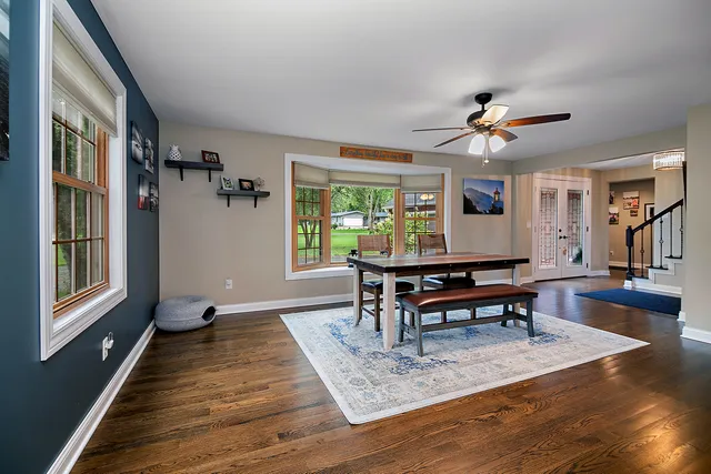 a view of a livingroom with furniture window and wooden floor
