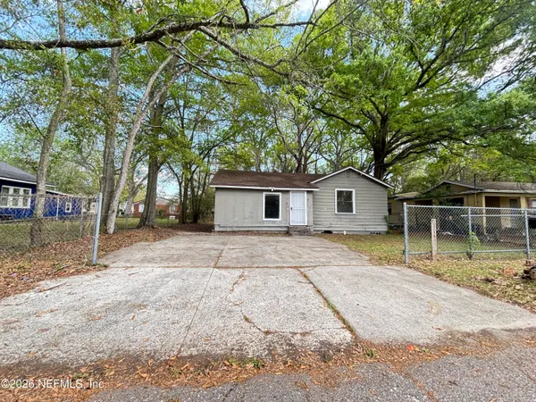 a house with trees in front of it
