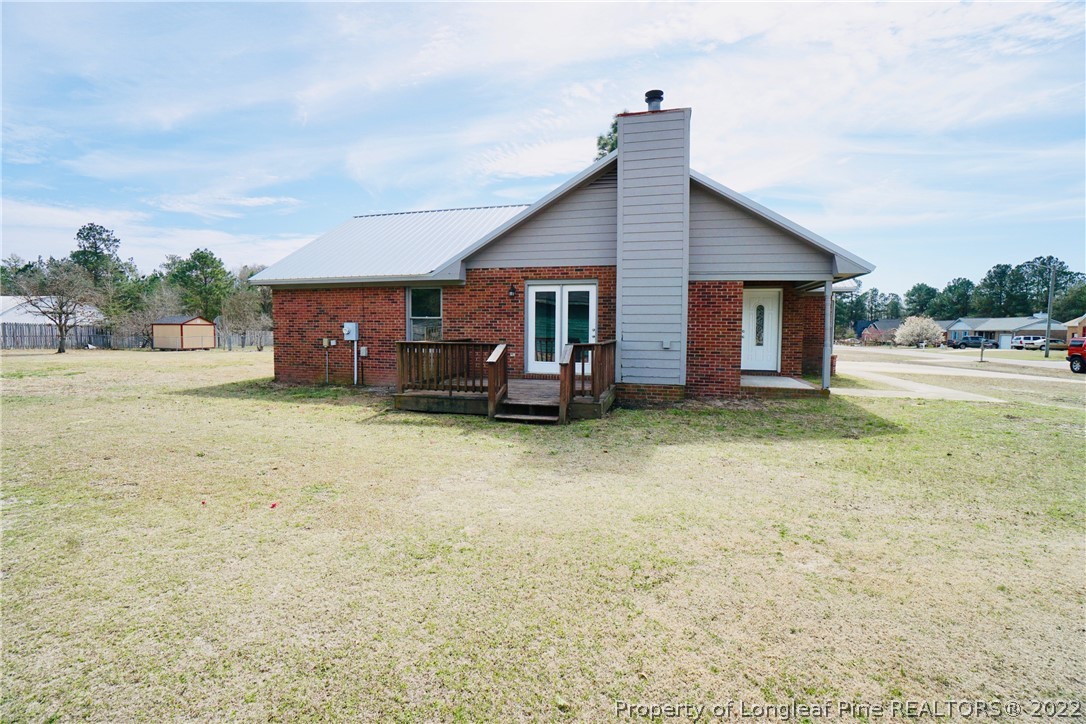 2537 Previs Road Fayetteville, NC 28306 - Photo 3 of 37 a view of a house with a yard and sitting area