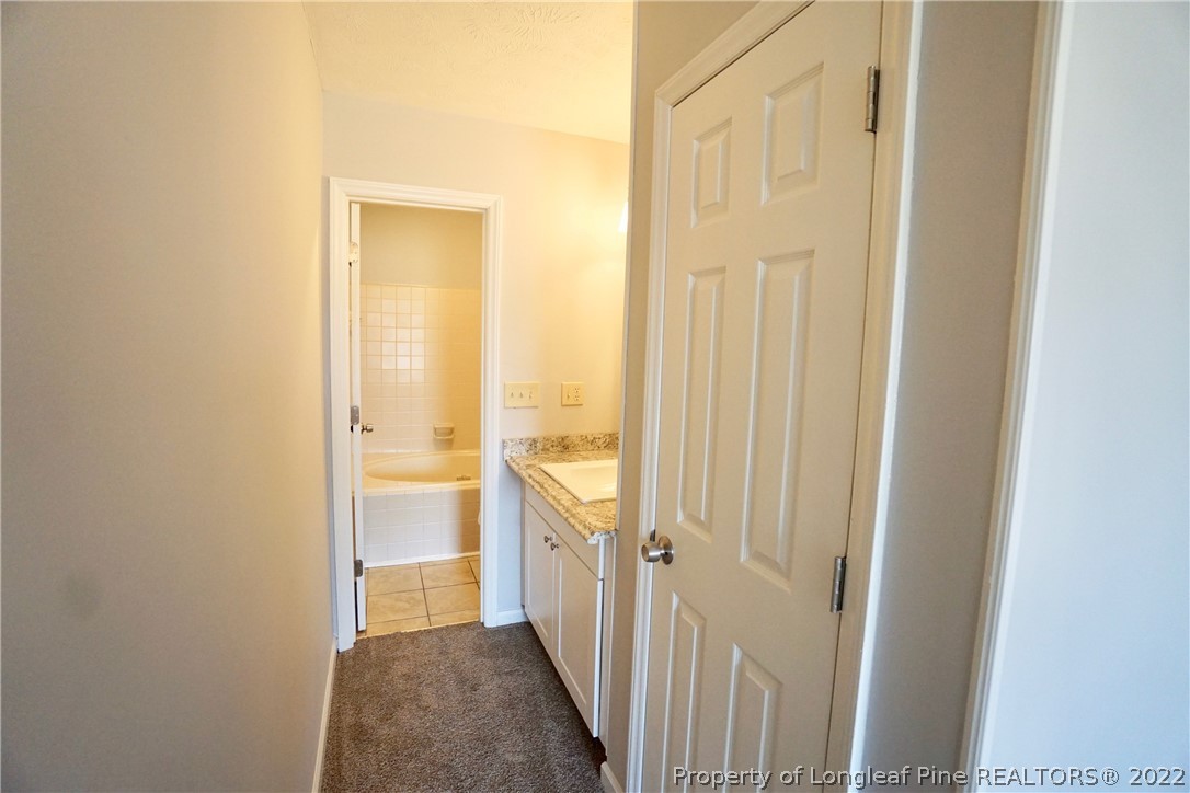 2537 Previs Road Fayetteville, NC 28306 - Photo 36 of 37 a view of a bathroom with a sink
