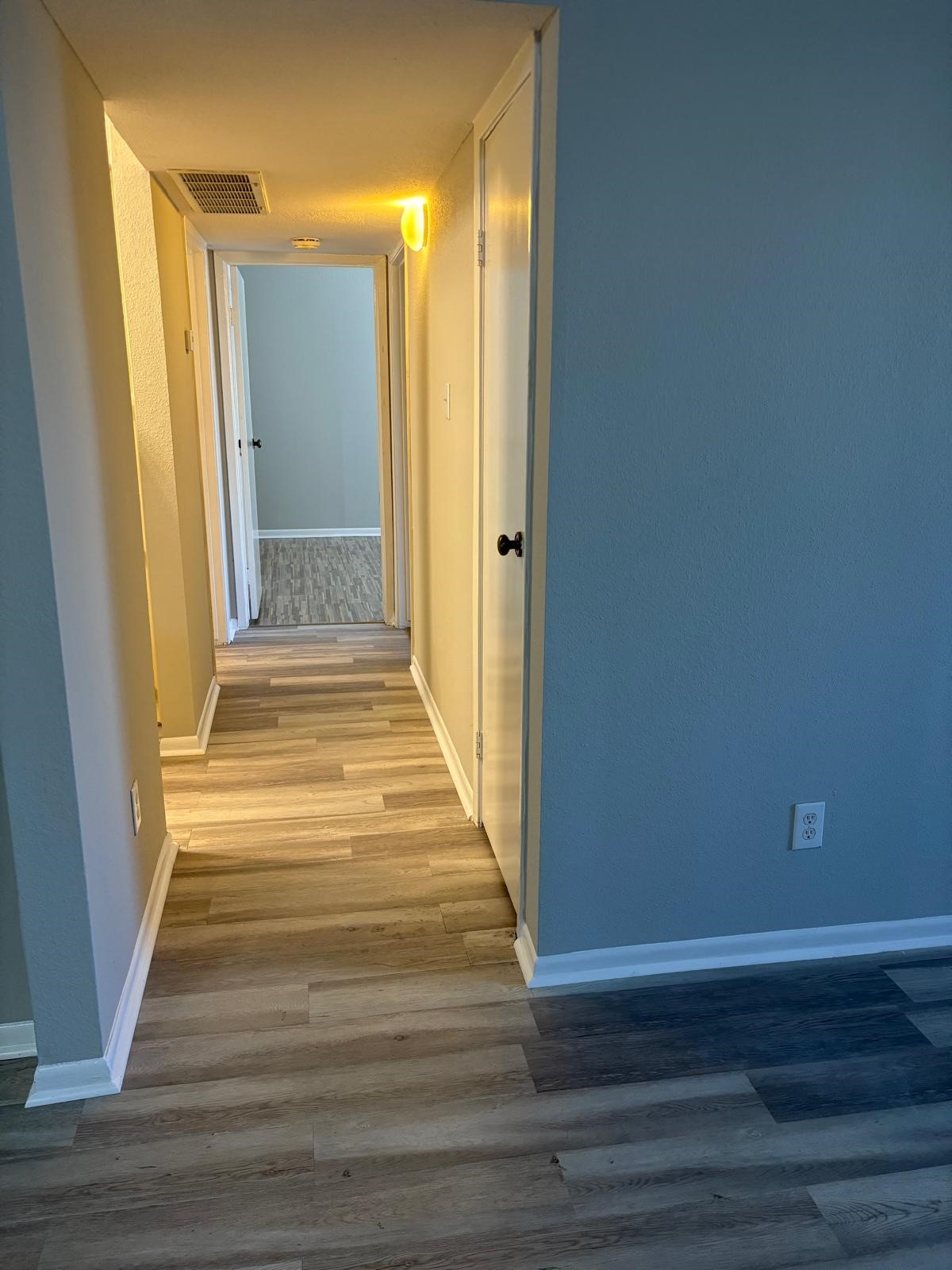 3055 Walnut Bend Lane, Unit 33 Houston, TX 77042 - Photo 12 of 18 a view of a entryway door with wooden floor
