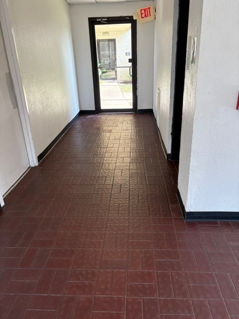 3055 Walnut Bend Lane, Unit 33 Houston, TX 77042 - Photo 17 of 18 Ground floor building side entrance