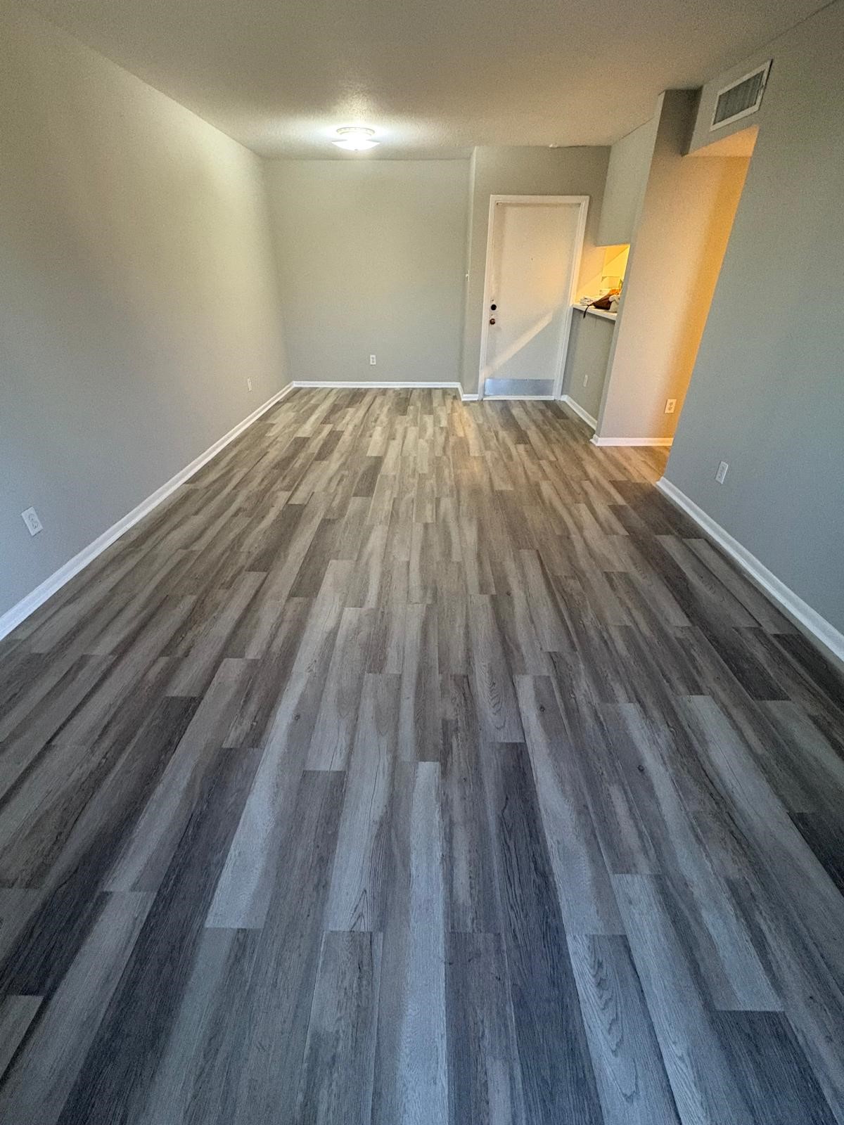 3055 Walnut Bend Lane, Unit 33 Houston, TX 77042 - Photo 2 of 18 a view of empty room with wooden floor