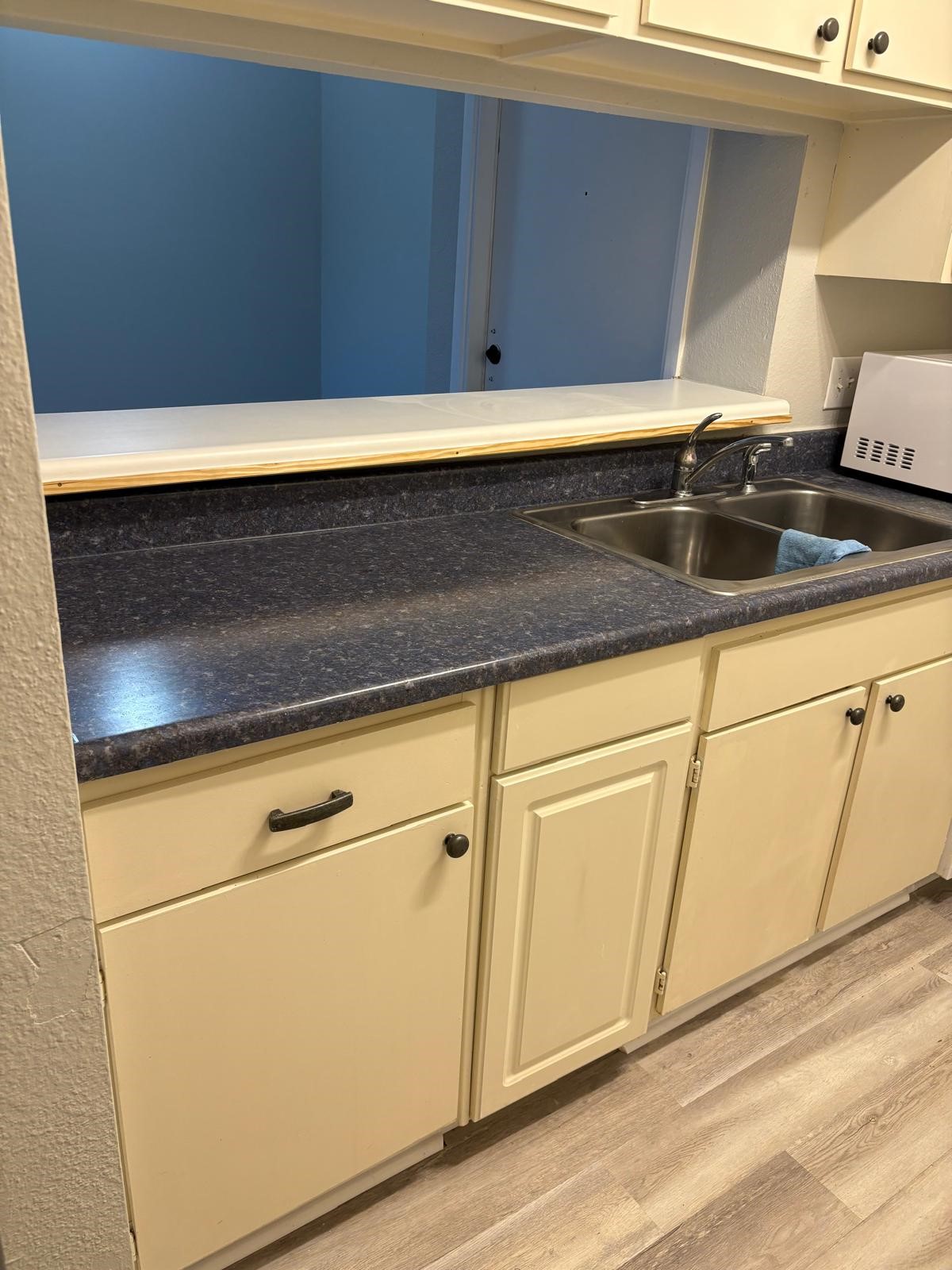 3055 Walnut Bend Lane, Unit 33 Houston, TX 77042 - Photo 10 of 18 a view of kitchen with granite countertop cabinets