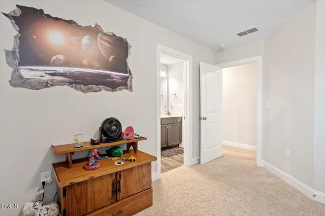 a room with furniture and wooden floor