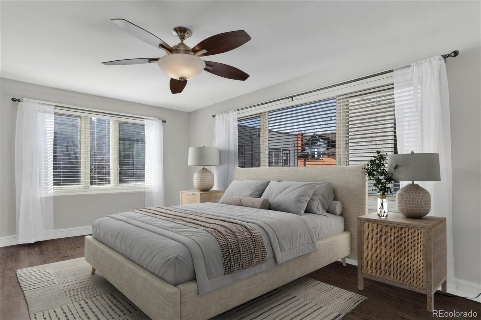 2311 Decatur Street Denver, CO 80211 - Photo 14 of 31 a bedroom with a large bed and a window