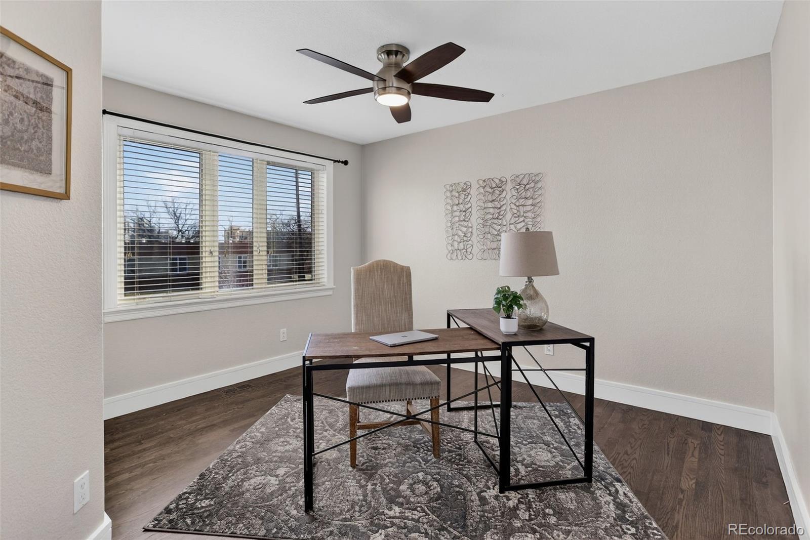 2311 Decatur Street Denver, CO 80211 - Photo 18 of 31 a workspace with furniture and a window