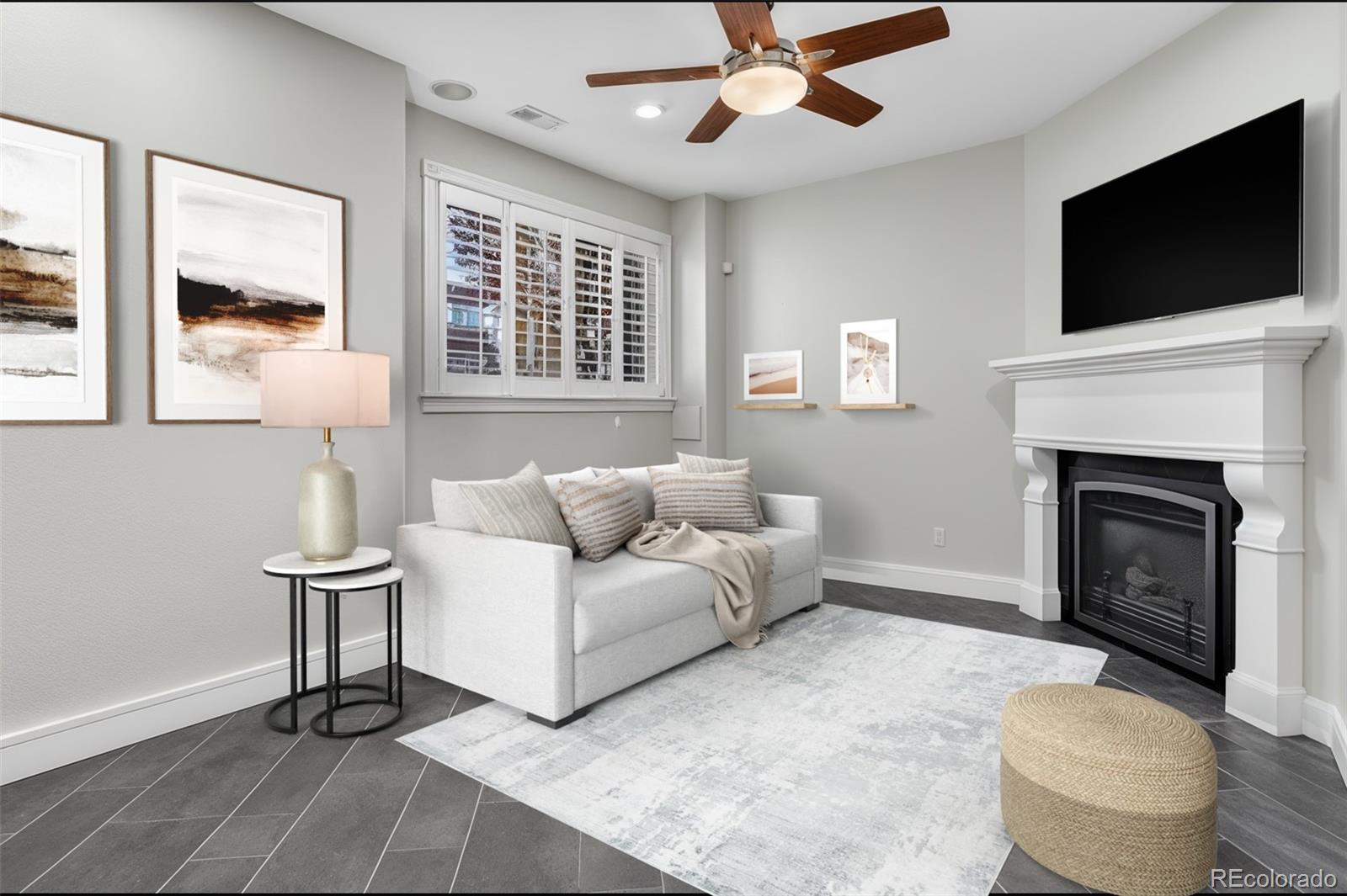 2311 Decatur Street Denver, CO 80211 - Photo 22 of 31 a living room with furniture and a fireplace
